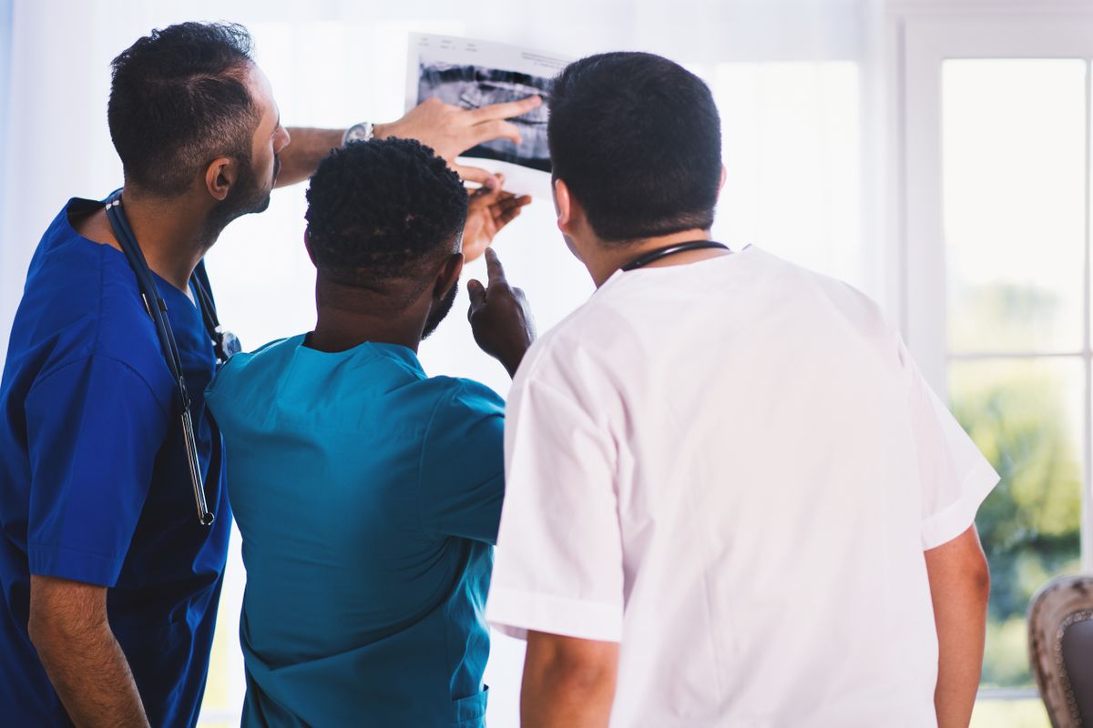 Clinicians reviewing a scan together